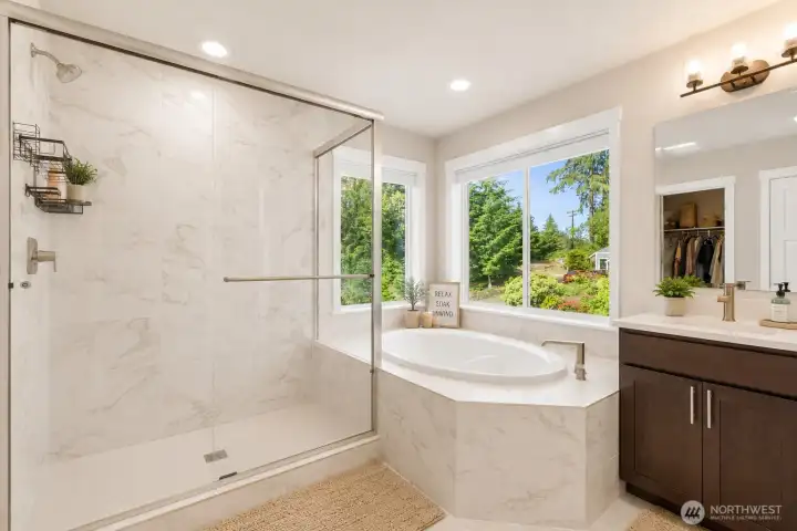 Ensuite with soaking tub and walk in shower-Virtually staged