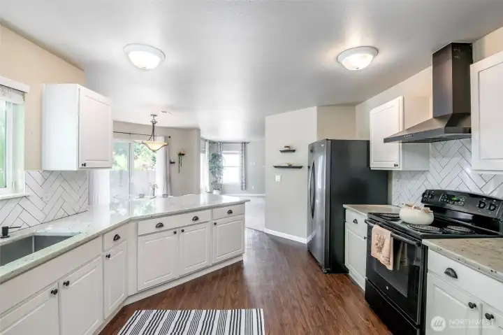 Great backsplash, ample space and storage.