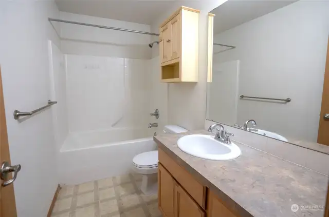 Spacious guest bathroom for your visitors' comfort.