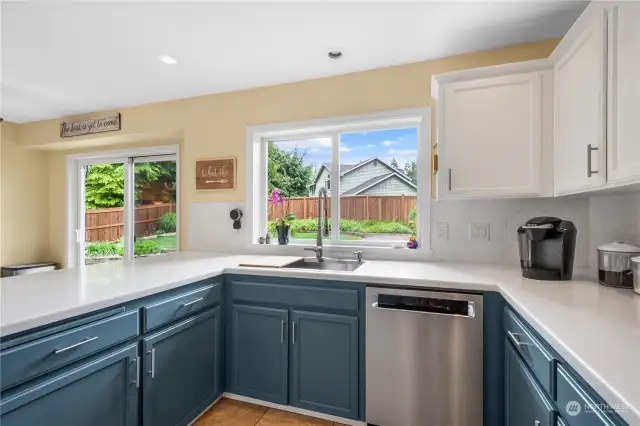Open kitchen with beautiful views to the private backyard.