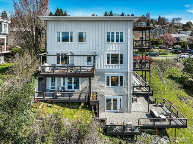 Note the wraparound deck below and bedroom deck above.
