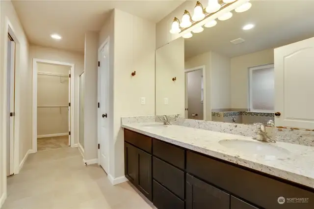 5-piece Primary bathroom. Quartz Counters, dual inks and very well lit.