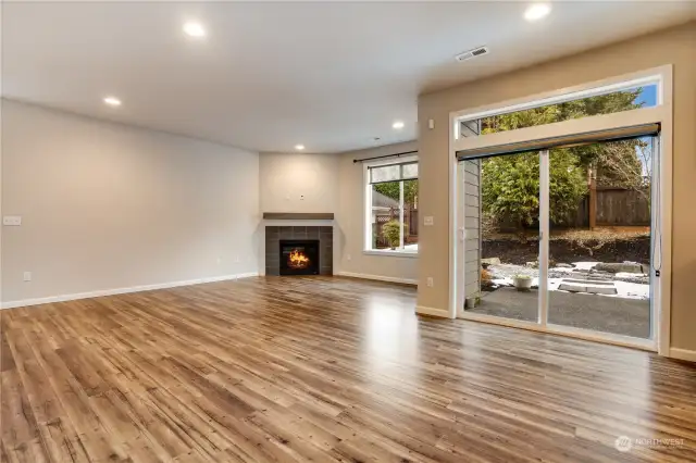 Central gas fireplace. This space is very private with backyard trees providing great shade during the summer and privacy throughout the year.