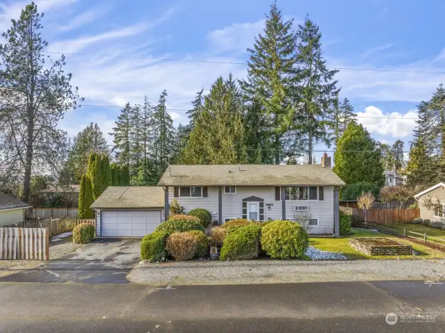 Adorable mid-century charmer set on a quiet dead-end street in sought after West Hill.