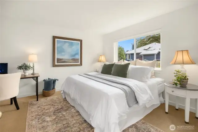 The ensuite bedroom in the ADU with south facing windows.