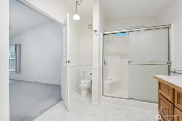 French doors lead to the Primary bathroom