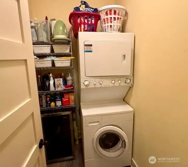 Laundry room with stacking W/D &  extra storage