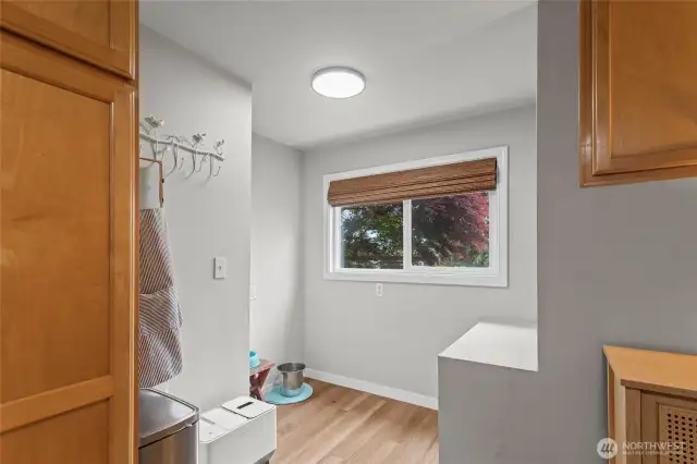 Kitchen nook that could be used for dining or storage.