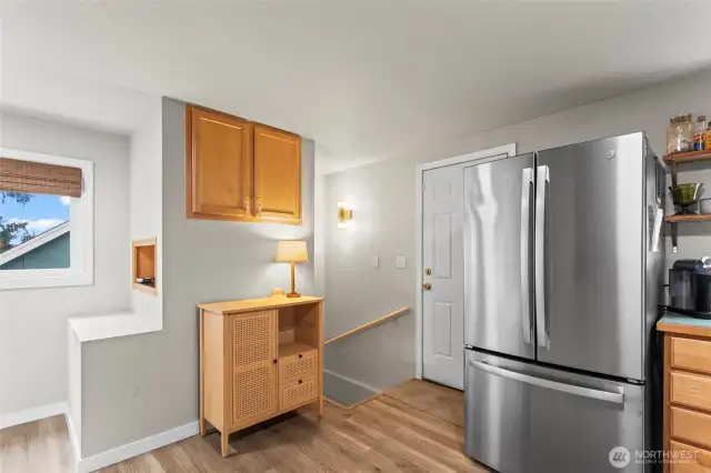 Stairs to lower level off of the kitchen.