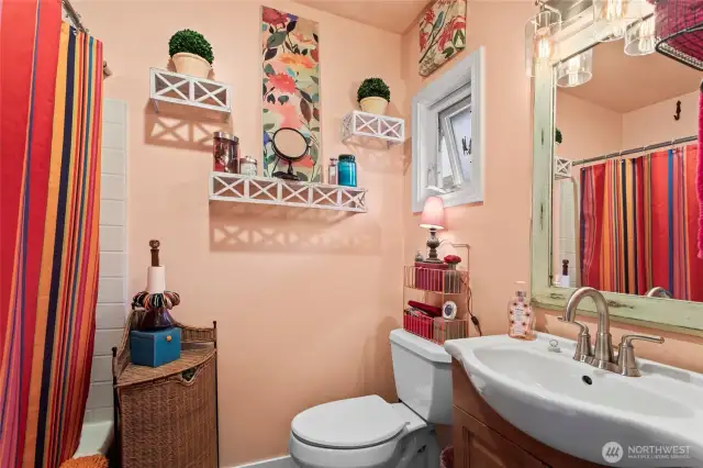 Full ensuite bathroom off of the rear bedroom
