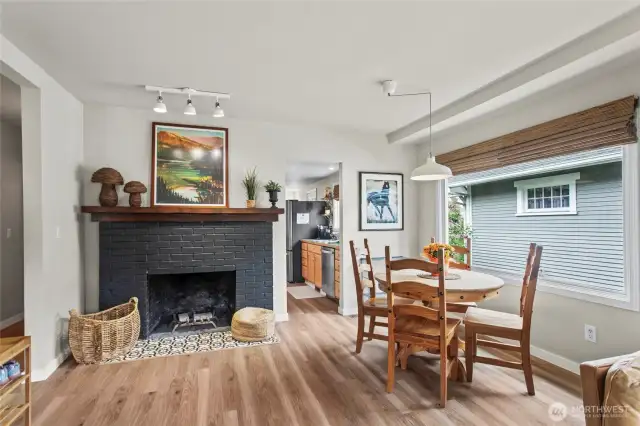 Wood burning fireplace adds a cozy feel to the updated space.