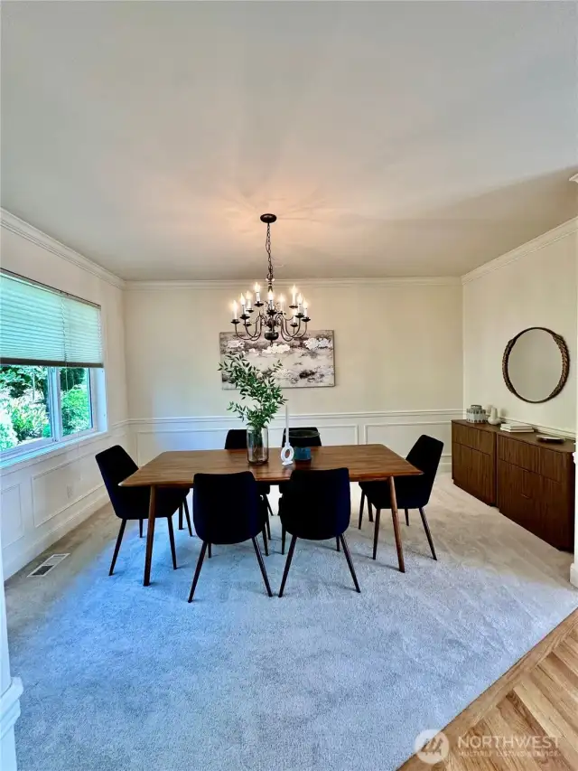 Large formal dining room with view of serene garden