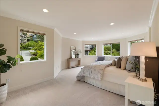primary bedroom with lots of natural light