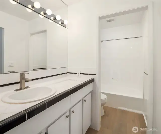 Primary Bathroom has tub and shower