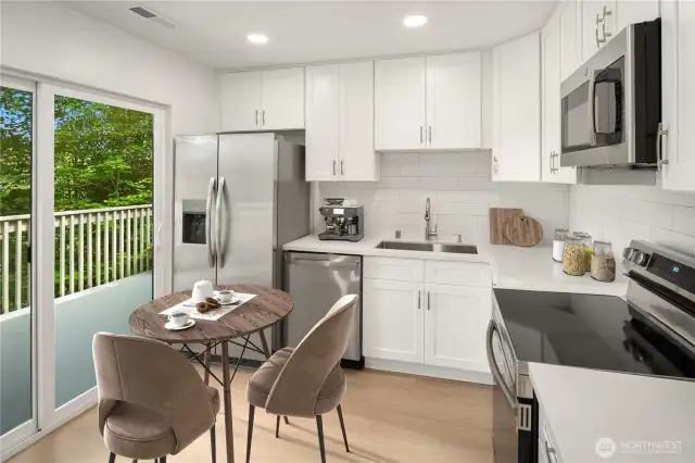Kitchen has space for a small table or additional work surface