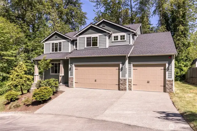 Welcome home! Nestled along a green space at the end of a cul de sac, this home has great privacy.