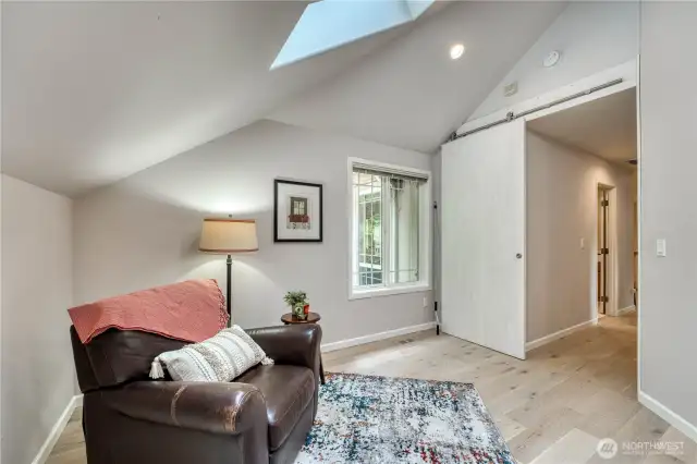Another view of the bonus room and its cute barn door.
