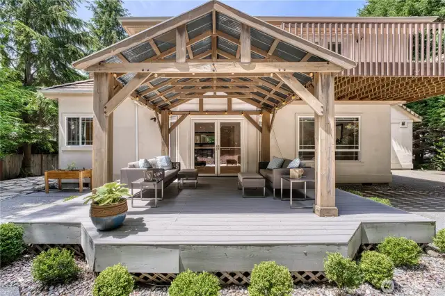 Covered back deck for fun all year long. Nice paver area to the left for additional seating, fire pit or???