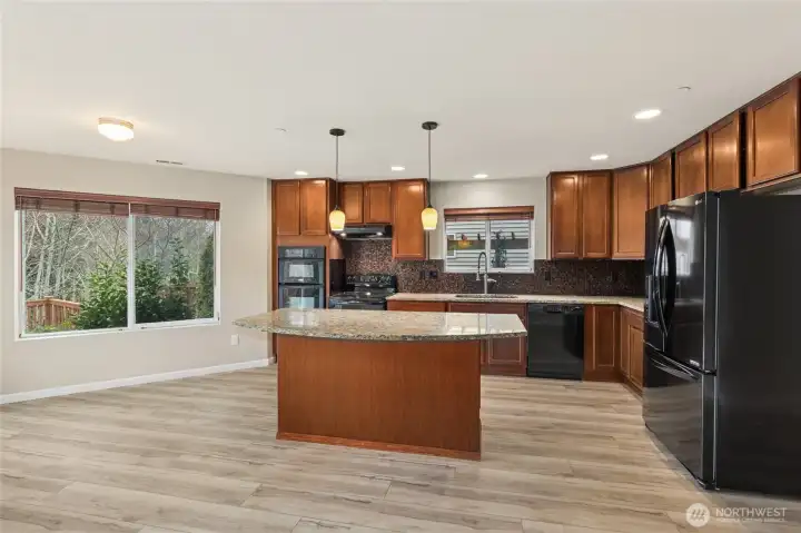 Large Kitchen with spacious island & dining area