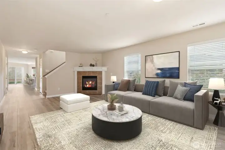 Entry living room with gas fireplace *virtually staged*