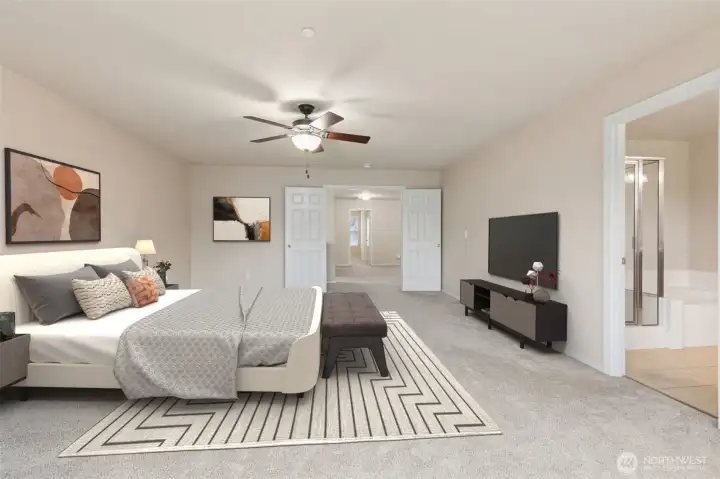 Primary Bedroom with 5-piece ensuite and walk-in closet *virtually staged*