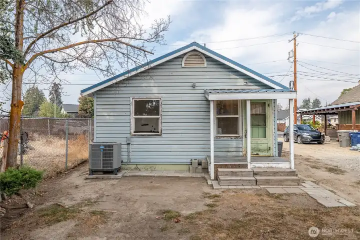 Back of home. New heat pump.