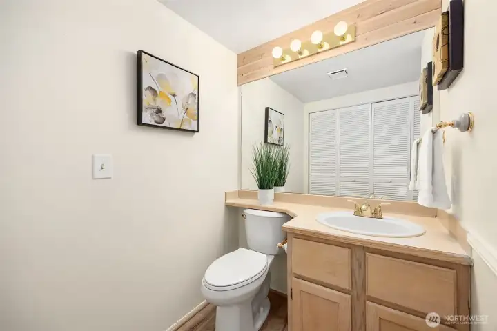 Downstairs powder room with brand new flooring!
