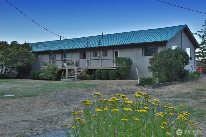 Main home entry on the left; apartment entry on the right.