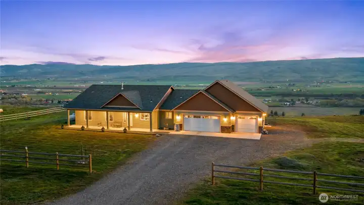 Warm and inviting custom home nestled on 4.62 view acres.