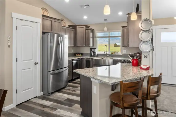 Kitchen with granite bar.