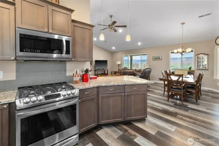 Kitchen opens to dining and living room.