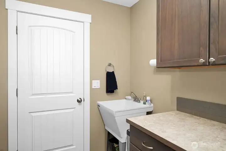 Laundry Room with outside exit.