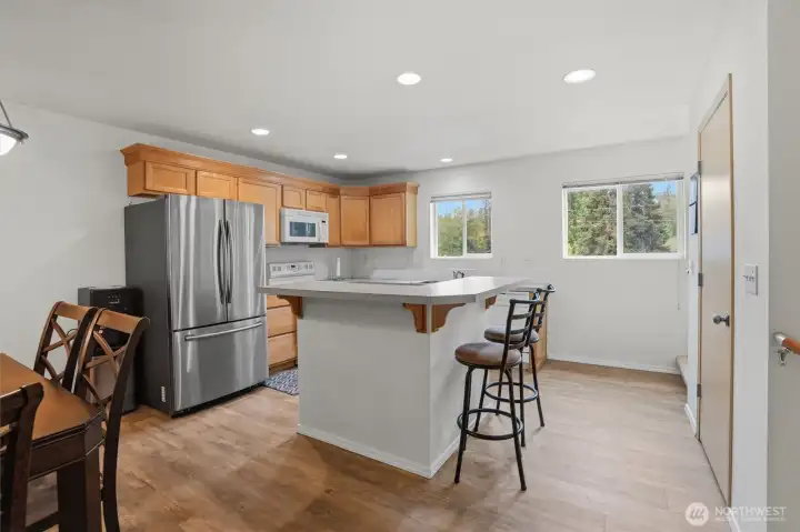 Large Kitchen with separate dining area and breakfast bar.