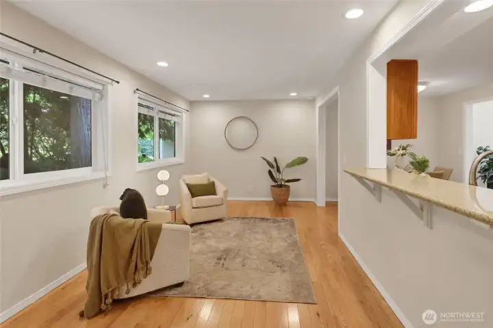 Large den on main floor off entry connects to the kitchen.