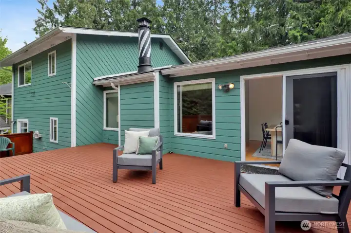 Huge back deck perfect for relaxing in privacy or entertaining guests.
