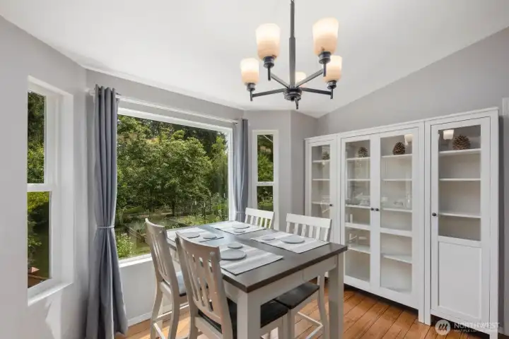 Dining area overlooking gardens Dining area overlooking gardens