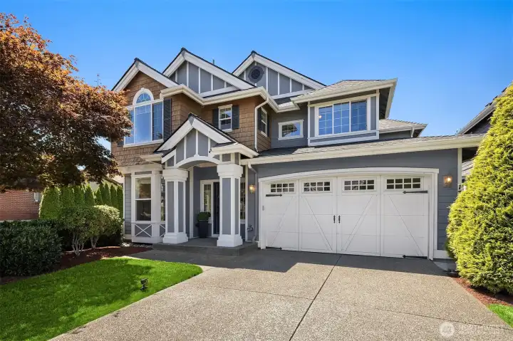 The home includes newer, heavy duty, carriage door style roll up garage doors, giving the home an elevated look.