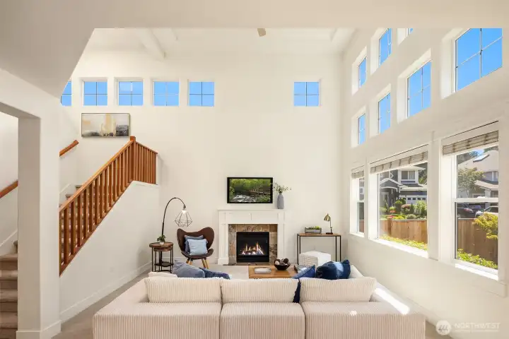 Double height vaulted ceilings in the family room with walls of windows making this a bright space, even on the gloomiest of days.