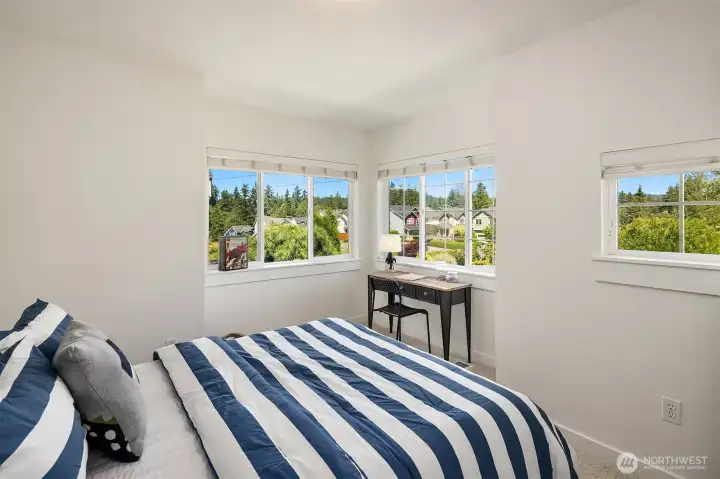 I love the windows in this third bedroom!