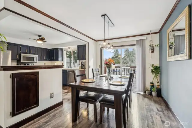 Open concept kitchen to dining and living room areas.