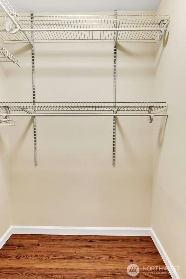 It's difficult to show in a photo the size of the walk-in-closet. Look at the floor plan for reference or come see for yourself!