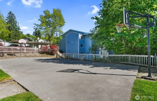 This sport court has basketball hoops and can be used for all sorts of activities!