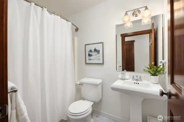 The full bath serves the 2nd bedroom.