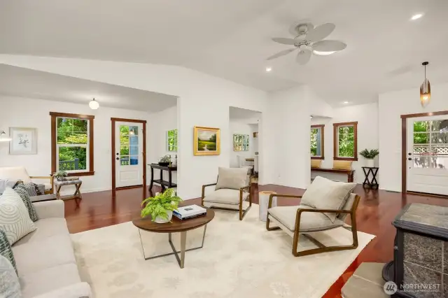 The foyer is to the left, the back door to the right. The wood burning stove to the immediate right.