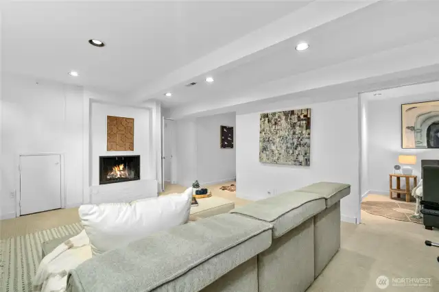 This view of the rec room shows there are 2 additional finished rooms off the large rec room.