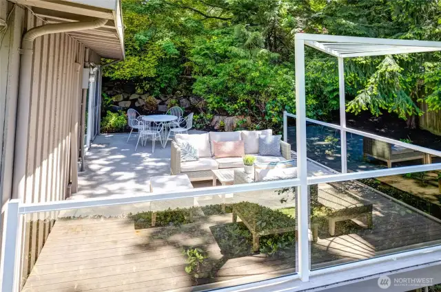 The spacious deck gets great light and is fit for entertaining with room to BBQ, lounge and dine.