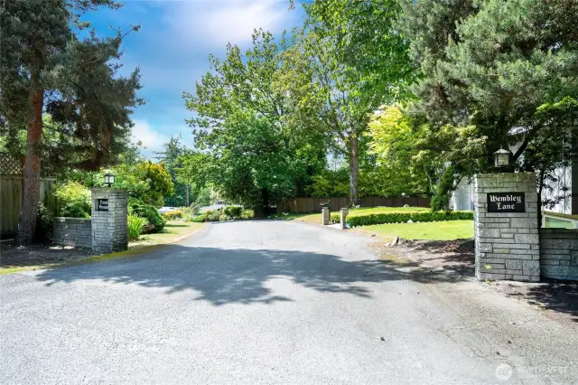 The entrance to Wembley Lane, a horseshoe shaped private lane of 10 homes surrounding a community pool.