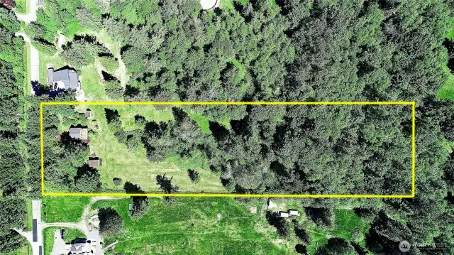 223' of frontage at the end of Lawson Road with a curved drive-thru driveway which extends down 988' to the North boundary and 972' to the South.  Parked out to enjoy forest adventures, atv rides through trails, and discoveries just waiting for you, your guests and family.