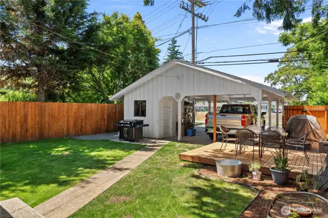Oversized carport and workshop.