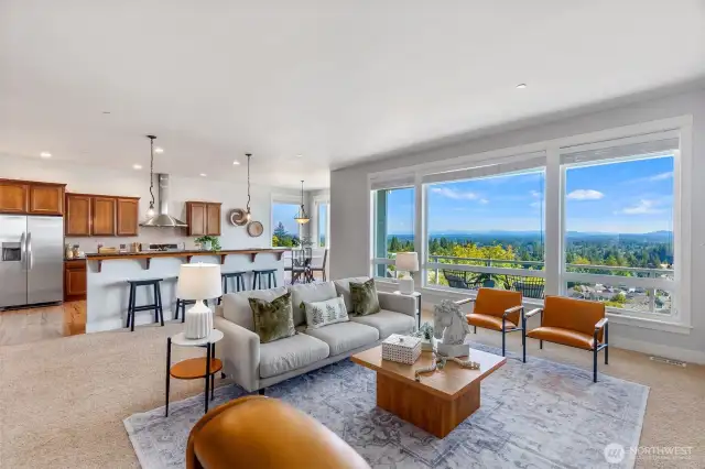 Walls of windows offer incredible views and fill the home with wonderful natural light.